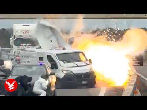 Masked gang blow up armoured truck on Italian highway