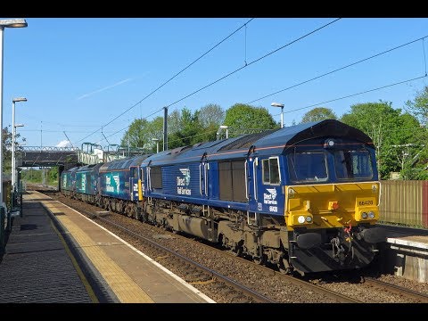 *Slow Pass Convoy*: DRS 66428 leads 57310, 68018, 68016 on 0K27 through Euxton, 10/05/18.