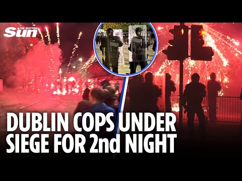 Violence escalates at Dublin migrant hotel for 2nd night as riot cops attacked AGAIN