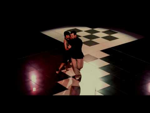  Murat Erdemsel  and  Michelle Erdemsel  are  dancing  to  the  tango  "  Cara Sucia  "