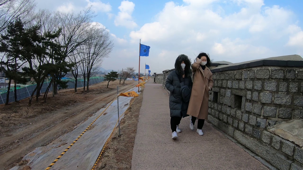 Immersive street-level walking tour through Suwon Paldalmun, South Korea, showcasing authentic urban landscapes, local architecture, and the vibrant atmosphere of the city's neighborhoods