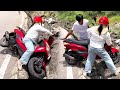 A Beautiful Woman Fell Down On The Roadside While Riding A Bicycle And A Young Man Helped Her
