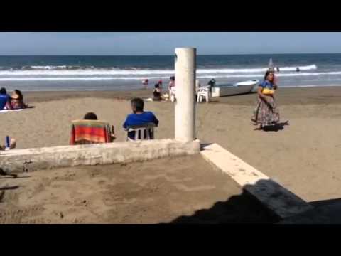 Exotic dancer on beach in Platinitos, Mexico