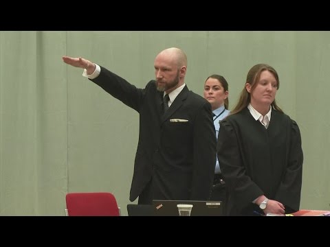 , title : 'Murderer Anders Behring Breivik gives Nazi salute in court'