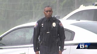 Alabama police officer stands in rain to pay respect for WWII veteran