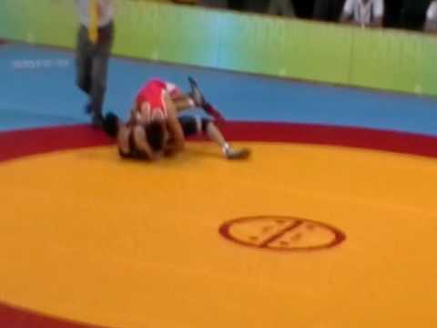 Deafylpmic Wrestling: Freestyle- Nikolaev, RUS (red) vs Samadi Piragheibi, IRI for 55kg