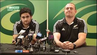 Sonny Bill Williams removes his shirt.