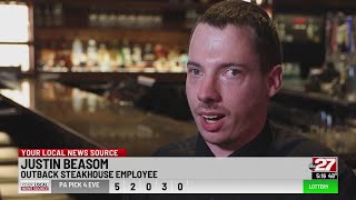 Autistic Outback Steakhouse employee celebrates successful employment in the Midstate