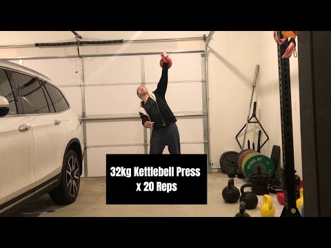 32kg Kettlebell Press x 20 Reps