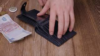 Чоловічий гаманець середнього розміру з натуральної шкіри ST Leather 22484 чорний