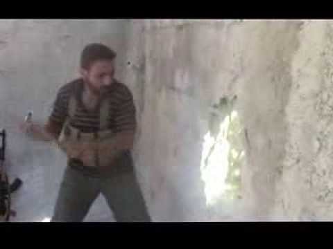 عملية فتح ثغرة بالجدار للتسل الى حاجز البناية في بلدة عتمان في ريف درعا من قبل كتيبة صياد الأسود