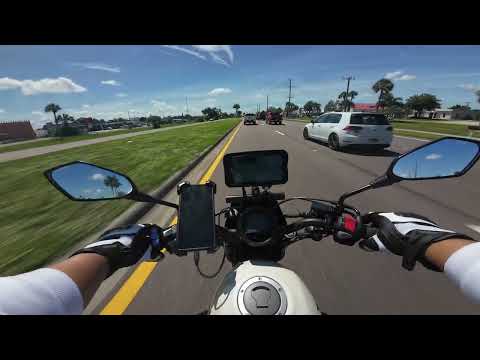 Shifting Gears on a Motorcycle in Heavy Traffic Walk though