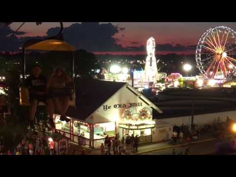 Iowa State Fair Sky Glider view at night of Fair main street and Amusement rides.