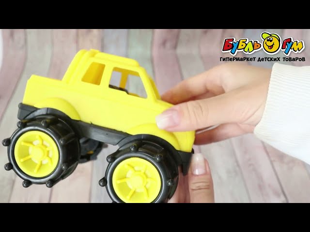 Автомобиль с большими колесами черно-желтый - видео