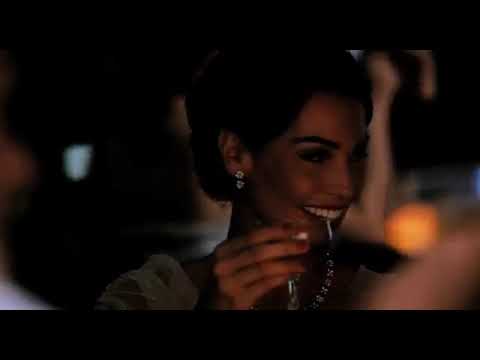 The Lost City trailer frame of Fico playing piano in a New York Cuban club