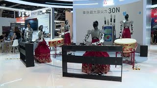Humanoide Roboter boxen und musizieren auf Hongkonger KI- und Robotikmesse