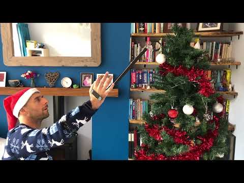 Rob decorates the tree and switches on the lights using a Reacher/Grabber and PlugTug