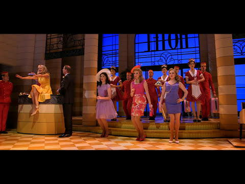 Dirty Rotten Scoundrels musical trailer still with Riviera set and suave con men
