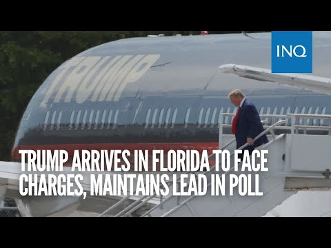 Trump arrives in Florida to face charges, maintains lead in poll