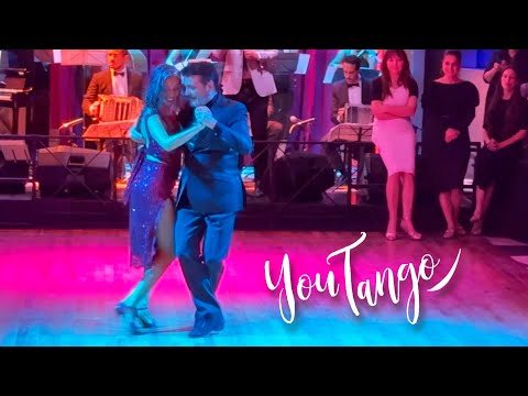  Carlos Rivarola  and  Natacha Poberaj  are  dancing  to  the  vals  "  Dichas Que Vivi  "  by  Orquesta Tipica Sans Souci  in  2024
