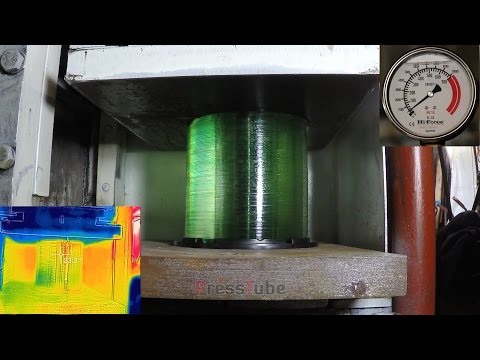 A Fat Stack Of CDs Actually Give The Hydraulic Press A Really Tough Time