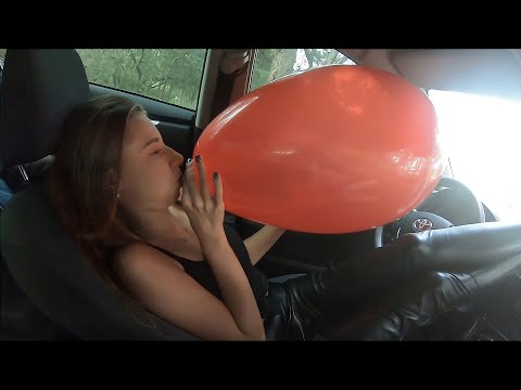 Brunette b2p three long balloons in the car