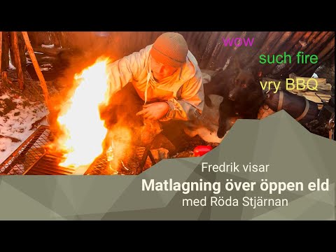 Fredrik lagar mat över öppen eld