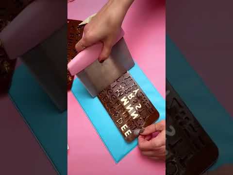 Watch me make chocolate letters #chocolatetutorial #cakedecorating #breakableheart #cakeinspo