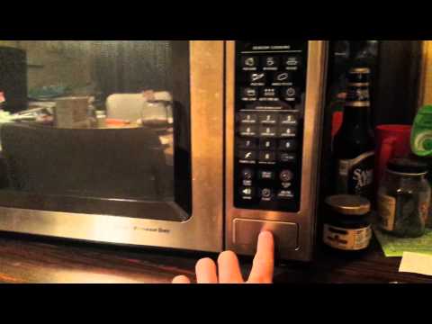 GE Microwave turns on by itself