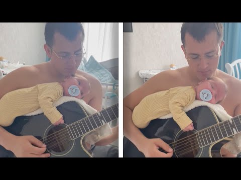 Dad Helps Baby Get To Sleep By Playing Guitar