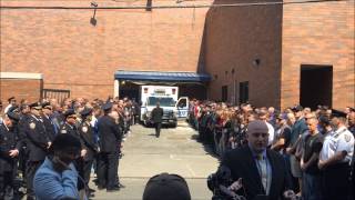 NYPD TOP BRASS TRANSFER BODY OF MURDERED POLICE OFFICER BRIAN MOORE TO HIS FAMILY FOR BURIAL IN NYC.