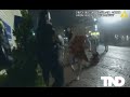Caught On Camera Video Shows Officer Punch Woman In Jaw After She Appears To Kick Him In Groin