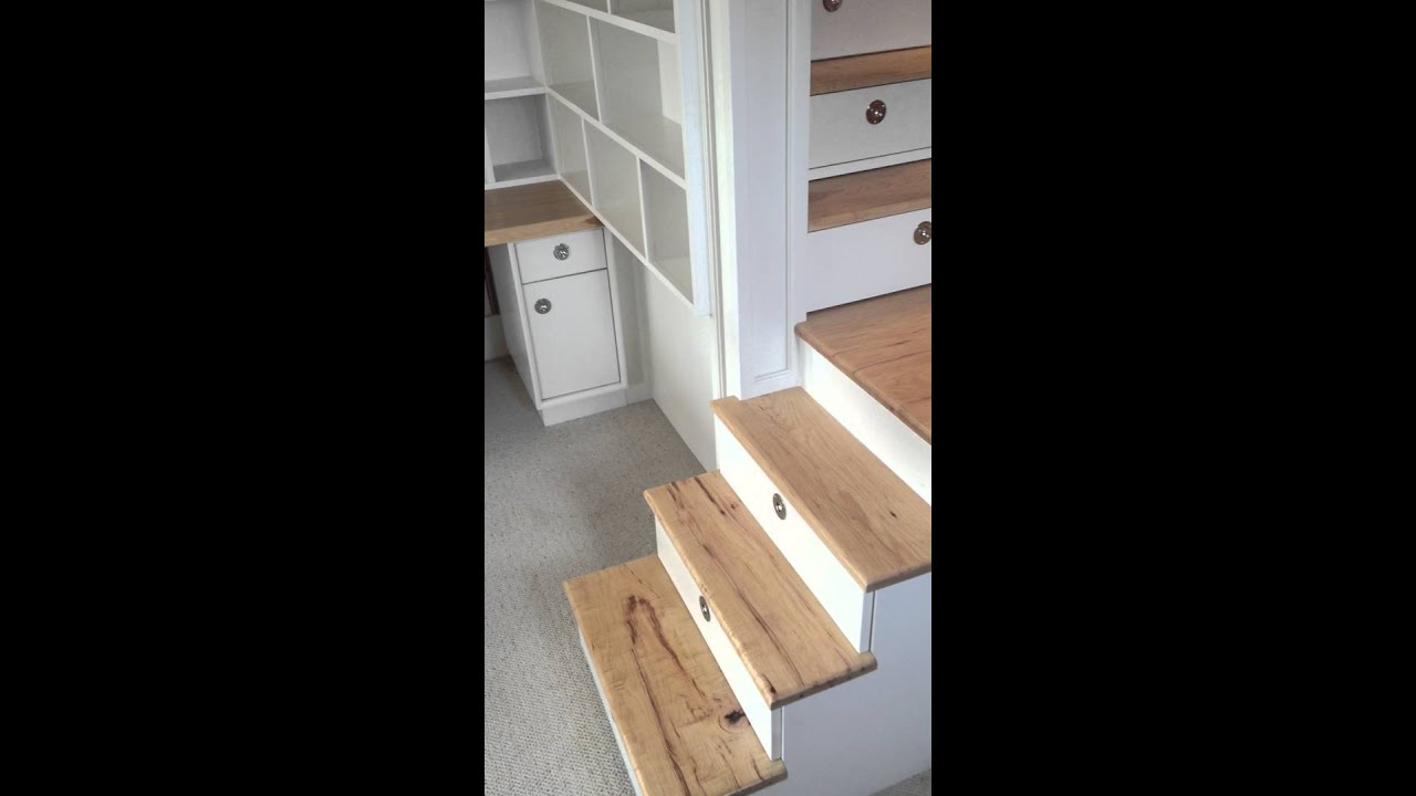 Loft bed with stairs, drawers, closet and desk