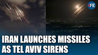 Download lagu Iran Launches Missile Barrage As Tel Aviv Sirens Sound During Israeli Strikes mp3