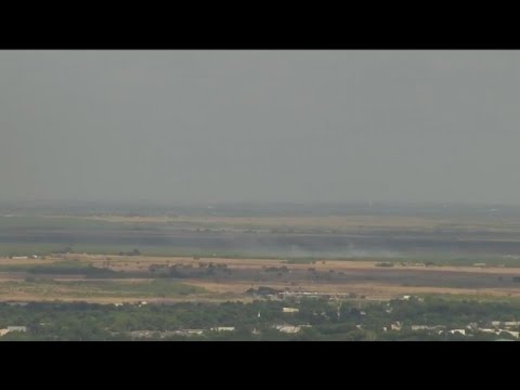 Several fire crews on scene for large grass fire