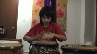 10 year old boy playing Conga