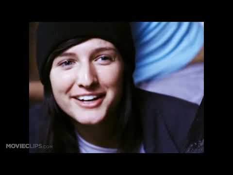 Trailer frame: late-night Los Angeles streets with passing headlights as a reflective cue plays