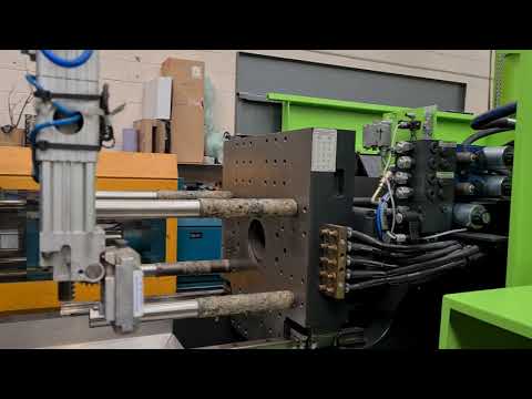 Engel 150 Tech refurbished by STV Machinery.  Viper robot and conveyor.