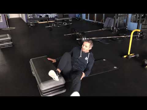 Feet elevated single leg glute bridge