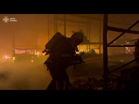 Emergency services respond to fires following early morning strikes on Ukraine's capital | AFP