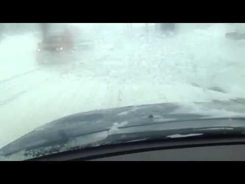 Driving down a snowy Loring Avenue in Salem, Mass.