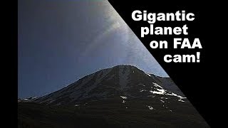 Mammoth striped planet hidden in plain sight on FAA weather cam. June 14 2018