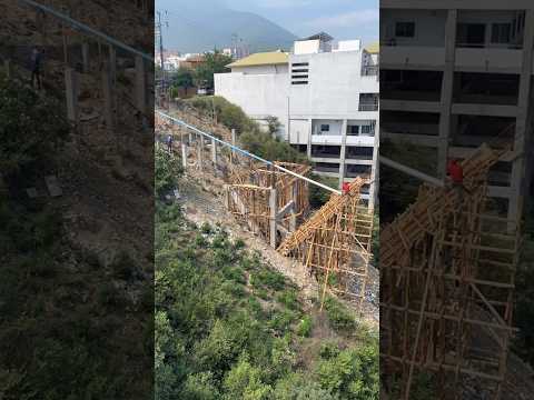 a modern building in land slide/steep slope area to.. #civilengineer #landslide #modernarchitechture