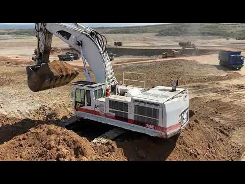 Caterpillar 385C Excavator In White Color Loading Trucks - Interkat SA