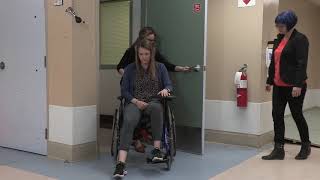 Manual Wheelchair Skill: Gets through hinged door , training with caregiver