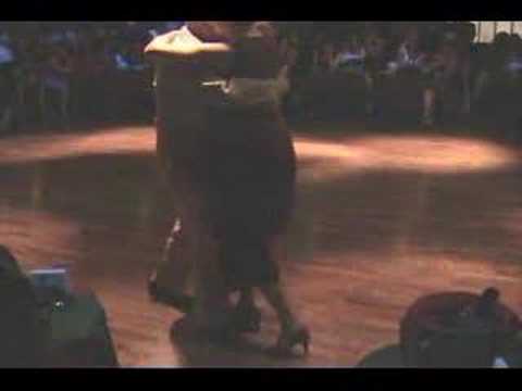  Ana Maria Schapira  and  Rubén Harymbat  are  dancing  to  the  tango  "  Amarras  "