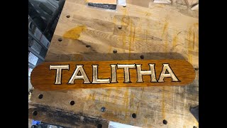 Finished carving new name boards with gold leaf!