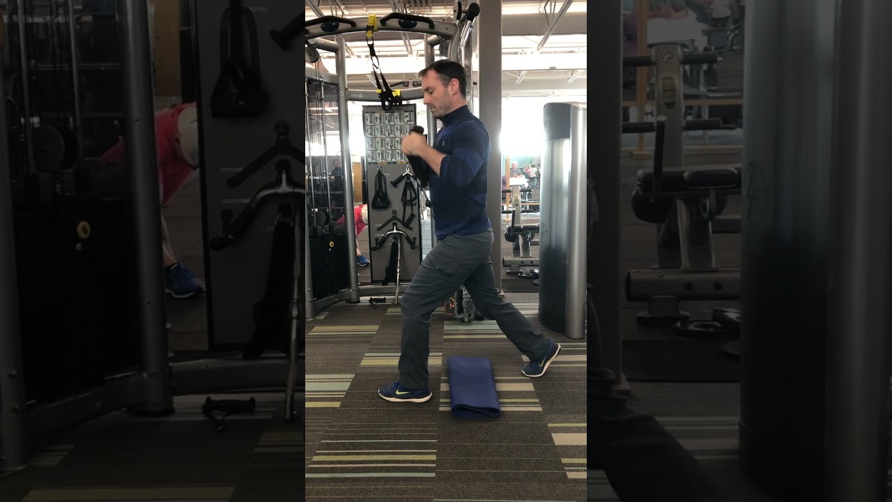 3. Split Stance Lift (Side View)