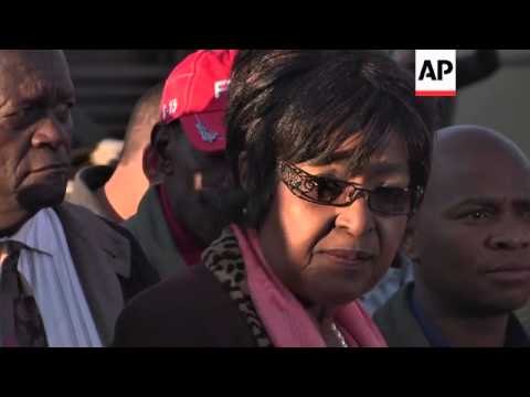 Mandela's ex-wife Winnie says his health has greatly improved but elder statesman is still unwell