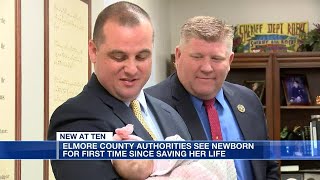 Elmore County deputy, investigator see baby for 1st time since saving her
